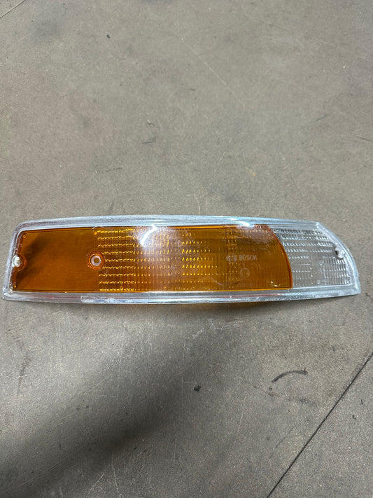 Genuine Porsche front direction lens ‘69-‘72 (chrome trim), p/n 911.631.924.03