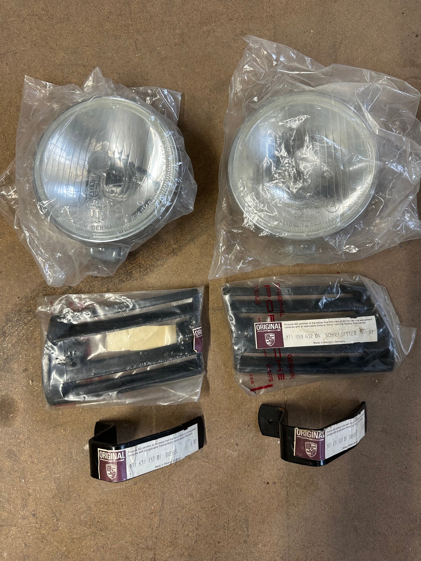 Pair of NOS genuine Porsche through-grille additional headlamps / fog lights - option M 433 for Carrera 2.7 RS