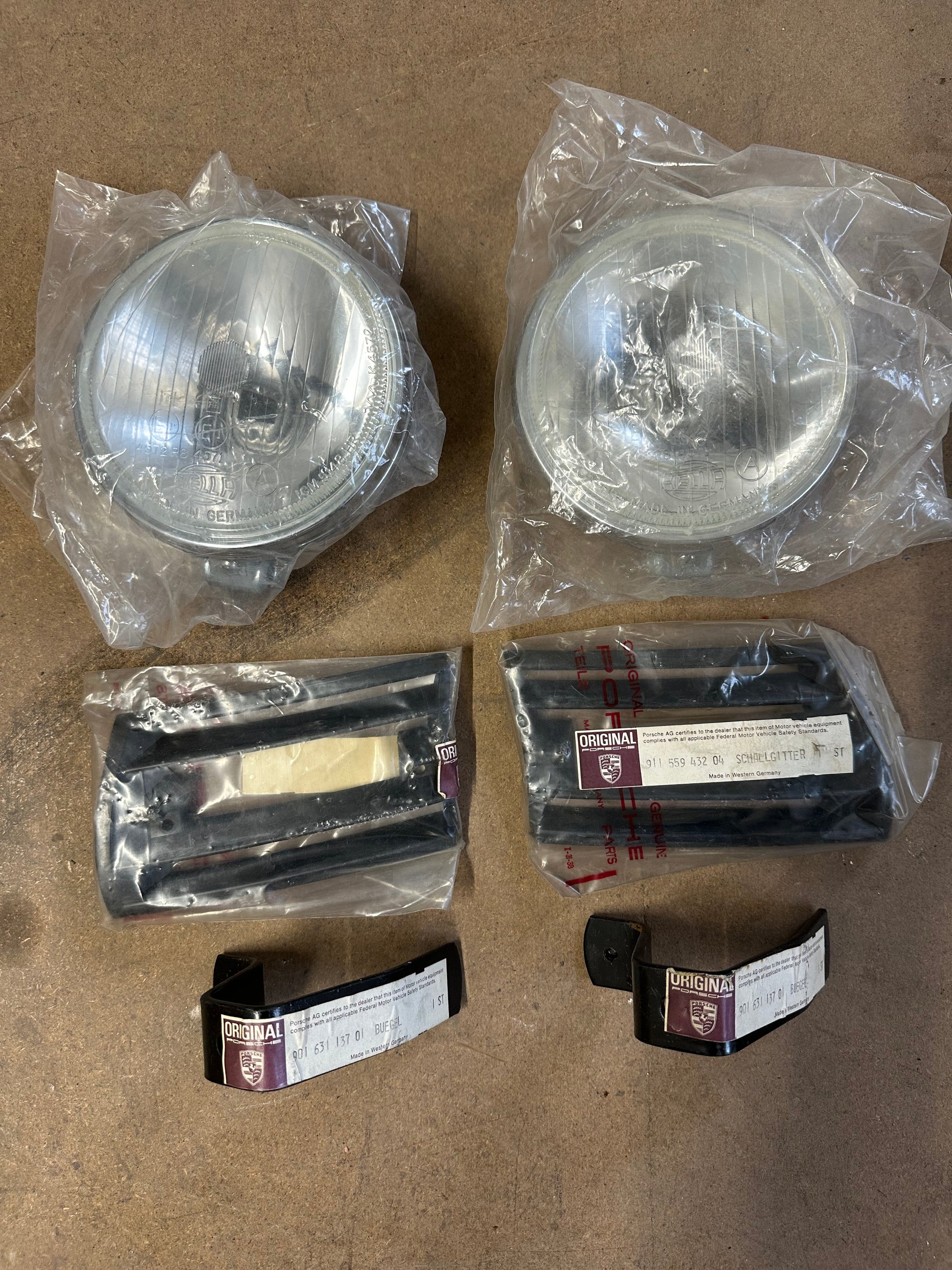 Pair of NOS genuine Porsche through-grille additional headlamps / fog lights - option M 433 for Carrera 2.7 RS