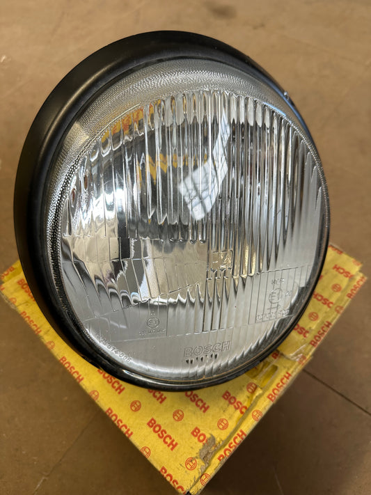 Pair of genuine Porsche / Bosch H4 headlamps for 911 G-model ‘87-‘89 (LHD) with RHD lenses, p/n 911.631.924.03