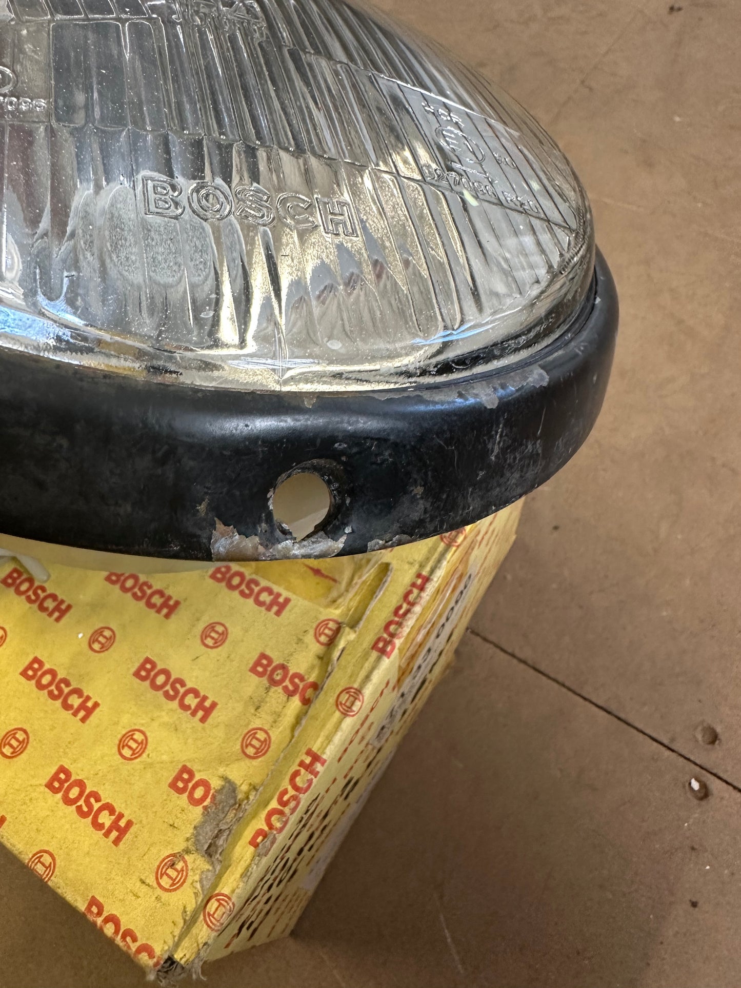 Pair of genuine Porsche / Bosch H4 headlamps for 911 G-model ‘87-‘89 (LHD) with RHD lenses, p/n 911.631.924.03
