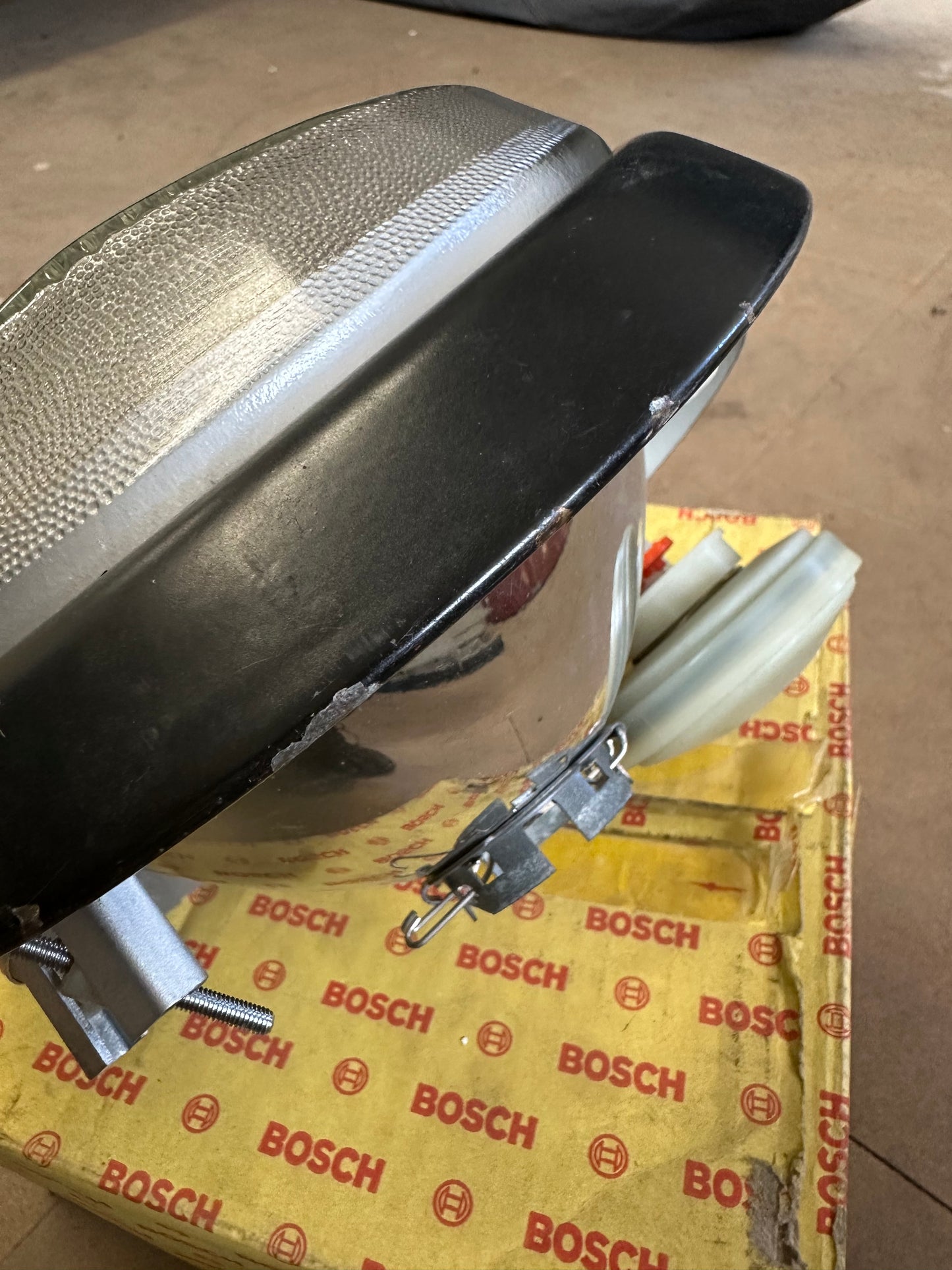 Pair of genuine Porsche / Bosch H4 headlamps for 911 G-model ‘87-‘89 (LHD) with RHD lenses, p/n 911.631.924.03